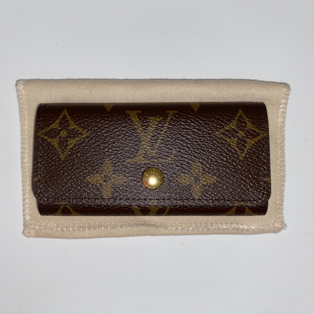 NWT Authentic Louis Vuitton Monogram 4 Key Holder